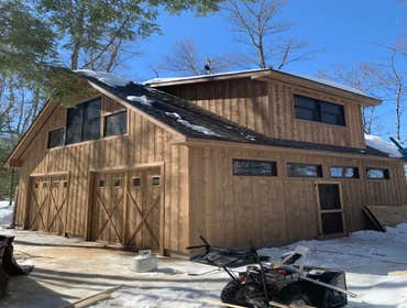 Barn shop Workshop with upper studio. Note custom doors