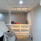knee wall with bookcase knee wall built with 4 bookshelves to load bearing column in basement