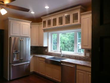 KITCHEN #4 This is a total replacement kitchen but it was kept in the same configuration as the original with a little dress up over the sink. These a