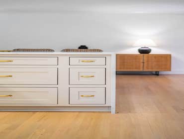 Photos by Albrecht, LLC #1 Through strategic space planning, thoughtful material selections, and custom craftsmanship, this first-floor renovation tran