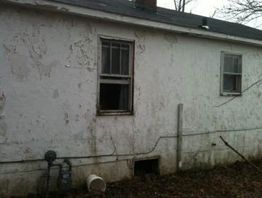 left side stucco view before
