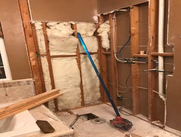 Photos by Griffin Tile & Marble Co #1 Master bath remodel. Remove PVC shower insert , remove separating wall , install new tile shower matching the til