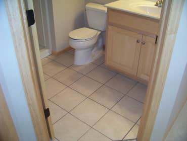 Finished Basement Finished a basement, framing, sheetrock, bathroom tile, bathroom vanity, ceiling tile, trim, doors and hardware.