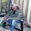 Talley's Painting & Remodeling logo