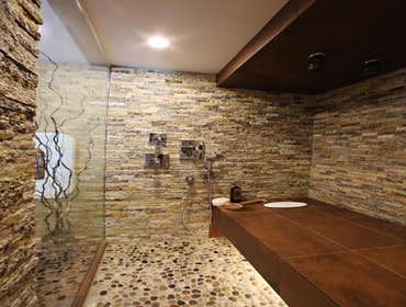 Large shower in Westlake Hills with full length Teak bench