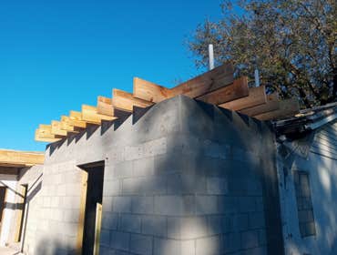 Boca Addition In Progress In progress, includes new roof, framing, concrete pour, rehanging of trusses.
