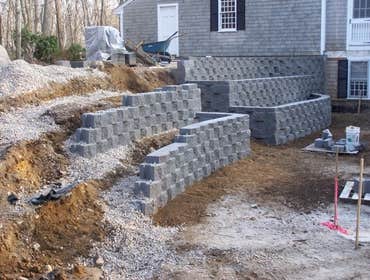 Lewis Landscaping Inc Project Residential & commercial lawn maintenance. landscaping, rock, stone, wall, patio, & walkway construction.