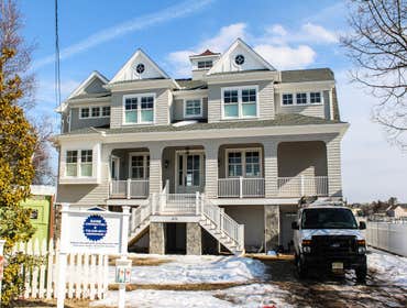 Baine Contracting Inc Project Multiple jobsites - showing kitchens, interior and exterior trim work, new homes, bathrooms, tile work, wood and iron ra