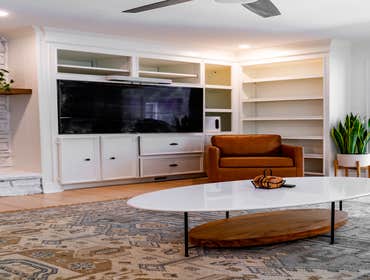 Photos by Albrecht, LLC #1 Through strategic space planning, thoughtful material selections, and custom craftsmanship, this first-floor renovation tran