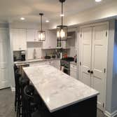 Samples of our work. We are a full service electrical contracting company. We can light up your kitchen counters. We can also make it easier to see in 