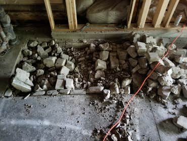 Photos by Tc Development Group Inc #3 Re support foundation, jack up foundation to fix sinking, re finish concrete, level floors upstairs in living are