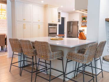 Photos by Albrecht, LLC #1 Through strategic space planning, thoughtful material selections, and custom craftsmanship, this first-floor renovation tran