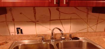 4013 Marshall rd Owner requested that exiting back splash be removed, and that new tile be installed