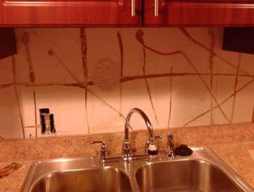 4013 Marshall rd Owner requested that exiting back splash be removed, and that new tile be installed
