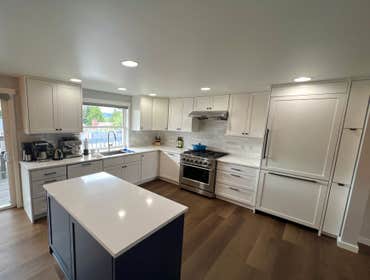 Photos by Pacific Remediation and Restoration #4 Kitchen remodel - Cabinets; countertops and backsplash; flooring; interior paint; appliance installati