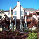 KP Builders, Inc. Project Outside deck, fountain and living space made from mainly environmentally friendly materials