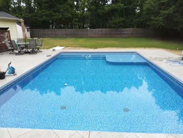 Photos by Mcm Pool Design, Inc #1 Inground Vinyl Swimming Pool Installation and Stamped Concrete Deck Installed Fall 2019