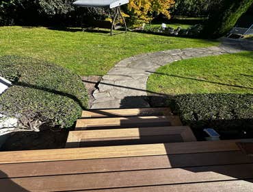 Photos by Vertex Decks LLC #1 Another beautiful project features TimberTech composite decking with a picture frame perimeter, including steps. The addi