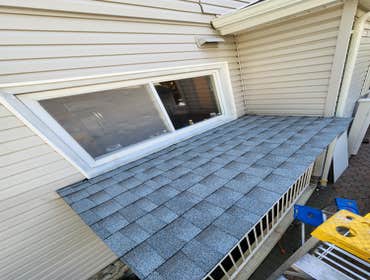 Photos by C&j All in One Property Solutions LLC #2 The small metal ceiling shed was removed and replaced with a new wood-framed shed finished with asph