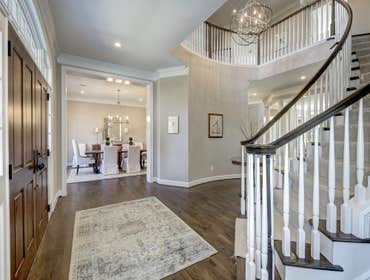 GULICK | CUSTOM Home in McLean The impressive stone and HardiePlank® elevation on our Winthrop really stood out on this corner lot of approximately one