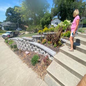Photos by Ground Attraction #1 We did the Retaining Wall driveway sidewalk landscaping and plants were now resurfacing his steps rebuild his deck...