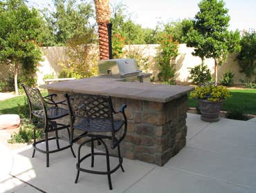 Tech-Noir Landscapes, Inc. Photos This display shows an array of fire pits, water features, and barbeques that add that special touch. Hard scape photo