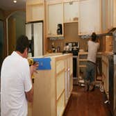 Photos by Modern Kitchen Makeovers #1 Complete Kitchen Remodel – A full redesign that includes new cabinetry, countertops, flooring, lighting, and layo