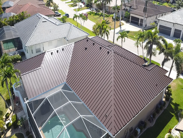 Photos by Resolute Roofing LLC #4 Tile To Aluminum Standing Seam. Bronze in color