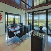 Photos by Elysium Builders, LLC #1 Luxury Custom Home featured as an Elite Home in various real estate magazines. Spectacular glass venues looking at t