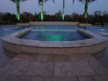 Savant Pool Project No, it's not Rome. However, this Grecian shaped pool along with the materials used creates a Roman forum for this Montgomery, TX h