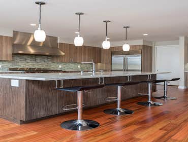 Muir Way, Belmont, CA This new construction project was designed with a sharply modern look and feel in mind. The cabinetry is done in a contemporary s