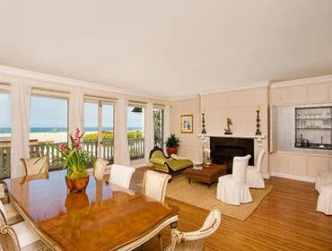 Open livingroom on the beach Beautiful Tan walls with swiss coffee on the ceiling and trim.