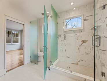 Cost effective modern primary and secondary baths Price includes master and 2 secondary baths. Master alone cost approximately 60,000.00. The primary c