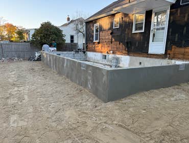 NORTHFIELD NJ FOUNDATION Excavation, Footing, Foundation Wall, Damp Proofing, Grading.
