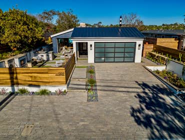Modern Coastal Perched atop the hills of coastal Encinitas, this ocean facing custom build features a modern design, sleek finishes, and luscious outdo