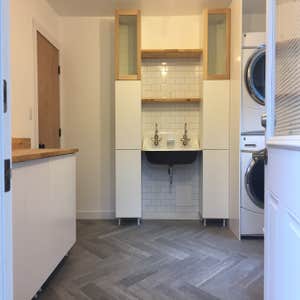 LAUNDRY ROOM REMODEL ASKED TO ADD IN FLOOR HEATING UNDER TILE. CLIENTS PICKED OUT ALL FINISHED ITEMS. FULL NEW ROOM REMODEL WITH NEW ELECTRICAL,...