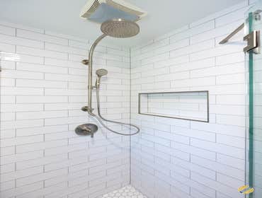 Newly Renovated Bathroom, Alexandria VA Timeless Bathroom Design. Combining white subway tiles with hexagon mosaic tiles that complement the seaport pa