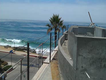 Marine Lair Here at the water’s edge stands Marine Lair, a Canter International Development project. Motivated by the ocean’s elements, every feature o