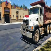 Taco Bell Brewton, AL Finishing up asphalt work on the Taco Bell in Brewton, AL. Performed all the dirt work, concrete, sewer and water lines, ALDOT en