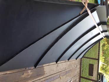 Black metal entrance awning