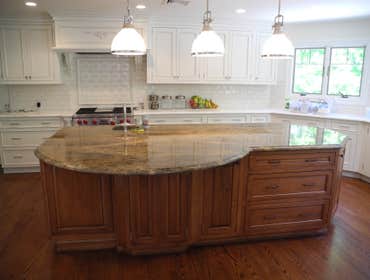 Kitchen Remodel; Central NJ A very large, High End Kitchen with mixed Cherry and White Cabinets. Granite center island and white Marble perimeter coun