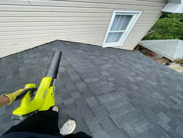 Photos by Us Success Properties LLC #1 Construction of a new roof structure over an existing residential deck. Scope of work included installation of s