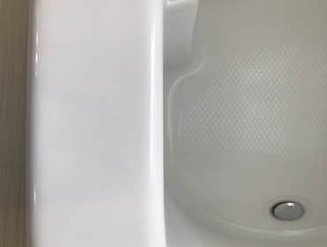 Bathtub Repair The homeowner chose to relocate plumbing fixtures - Original installation holes were properly supported and the repair area was refinish