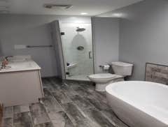 Photos by Allied Innovation Group #1 Examples of our flooring repair/refurbishment and bathroom remodeling at multiple locations