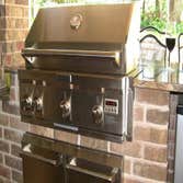 Cedar Garage Door and Backyard Kitchen