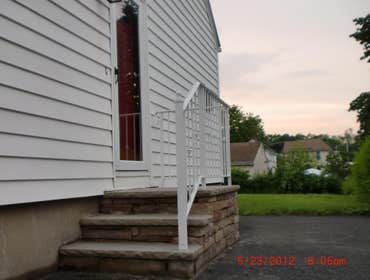 Project photos from Rc Home Improvement Contractors Llc STEPS:cinder block,veneer stone,railings in aluminum.