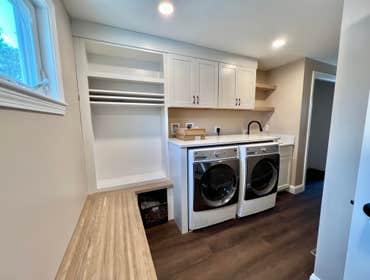 Photos by Lightship Development LLC #1 Complete remodel due to flood. Reconfigured master bathroom floor plan to accommodate over sized walk in shower.