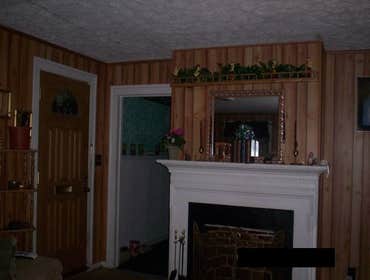 RENOVATION OF DINING ROOM Customer requested renovation of dining room
Added Paneling
Added Decorative Shelf Above Fireplace
Painted Fireplace
Ad