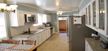 Ashland kitchen The new kitchen for the Ashland project features beautiful granite countertops, new cabinet doors, subway tile backsplash and a fresh c