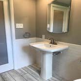 Custom Bathroom Remodel 1 Removed old fiberglass tub and surround. Install custom tile shower with glass. Install tile flooring. Custom linen closet wi